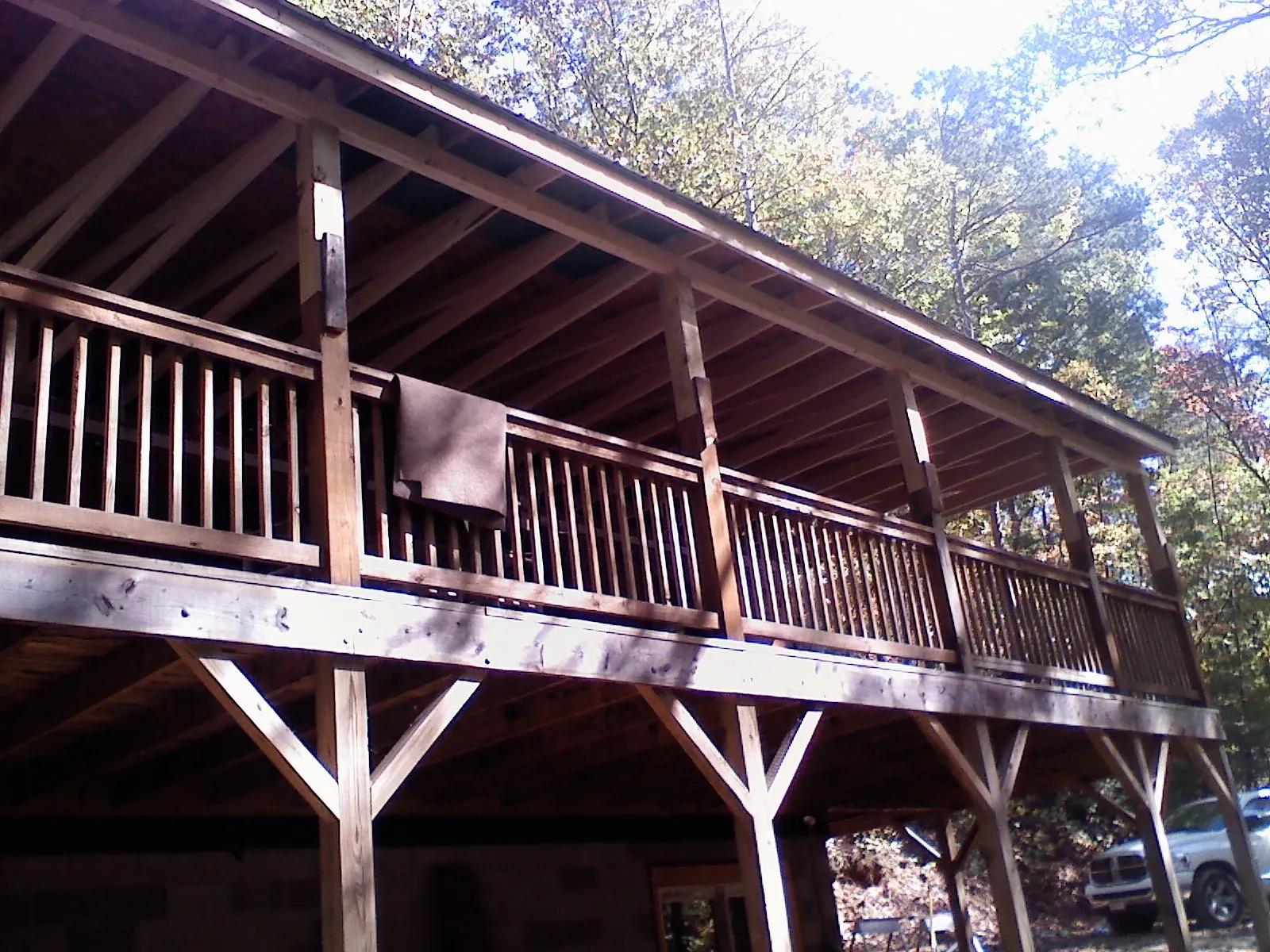 Timber framing under a new elevated porch and deck — Roof Leak Repair in Sweet Home by Roofing Brothers
